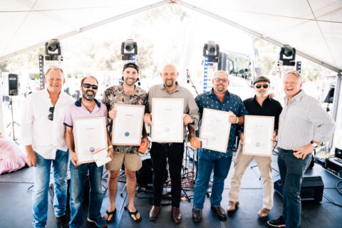 2022 Tenure Club members holding certificates 