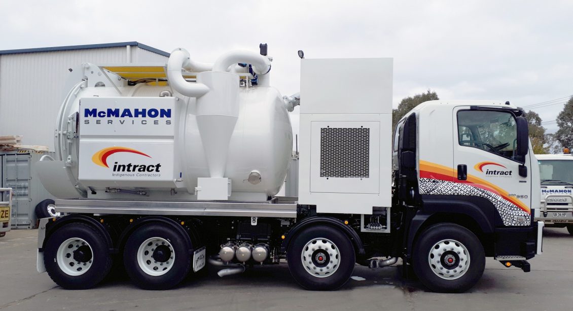 Side view of industrial vacuum recovery truck